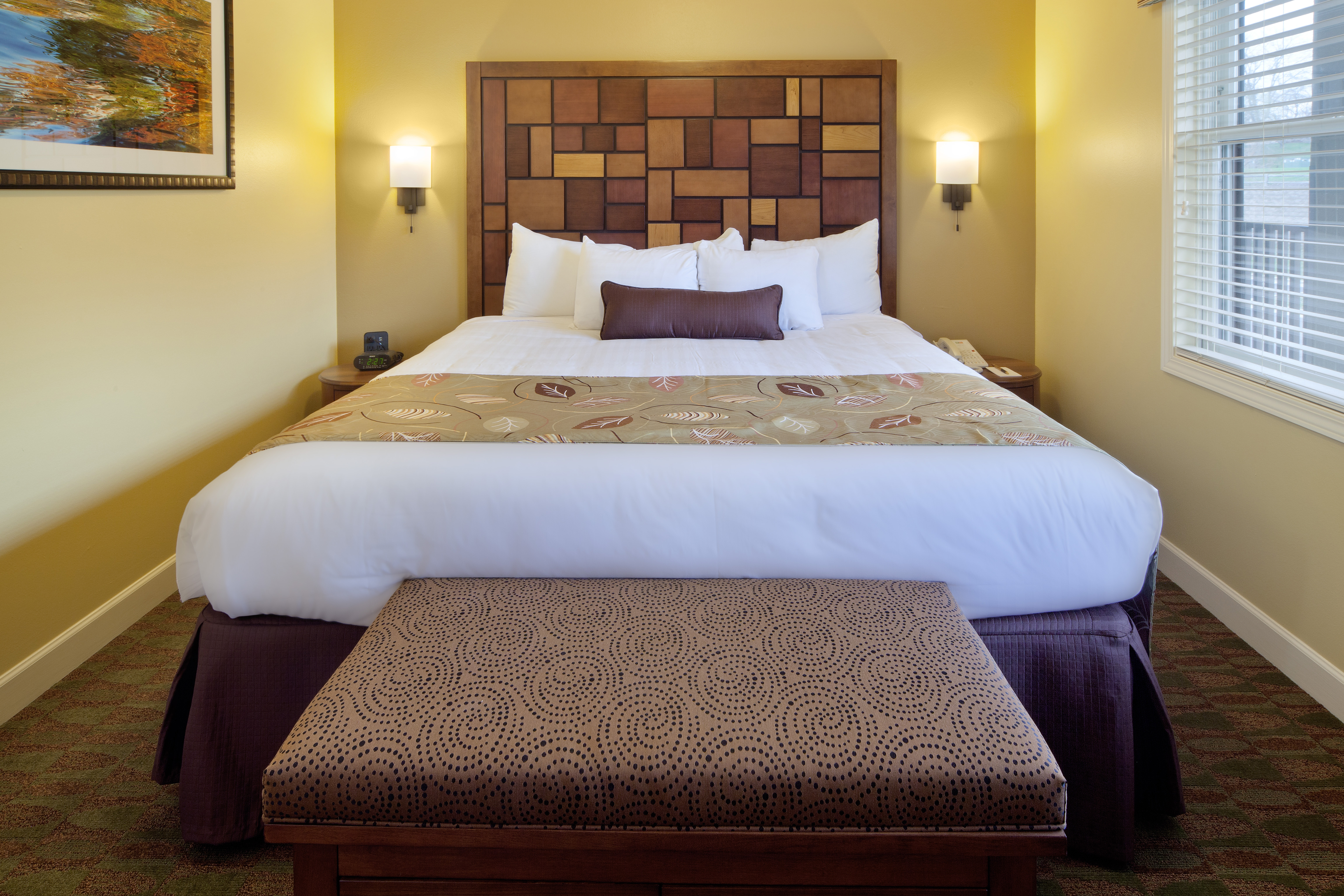 Master king bed in a one-bedroom villa at Lake Geneva Resort