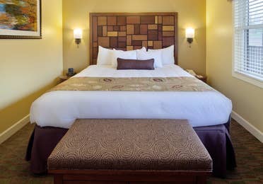 Master king bed in a one-bedroom villa at Lake Geneva Resort