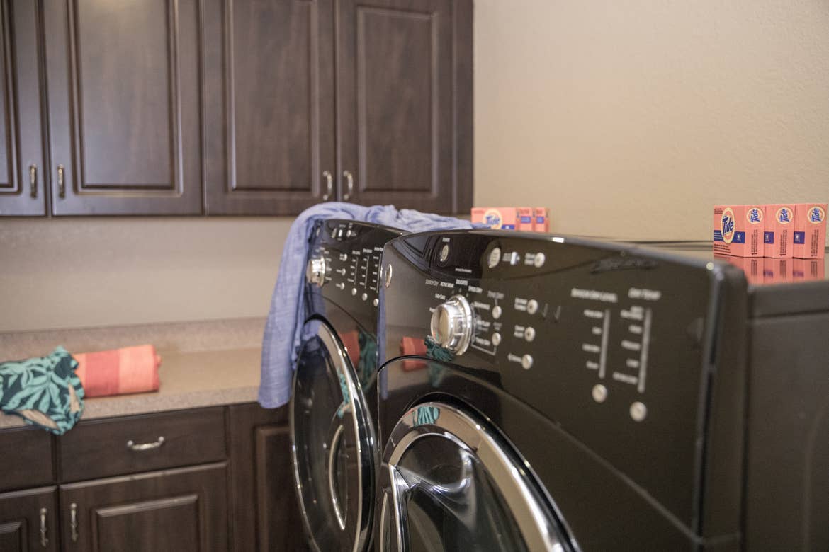 Closeup of in-unit washer and dryer in a Signature villa in River Island at Orange Lake Resort near Orlando, Florida.