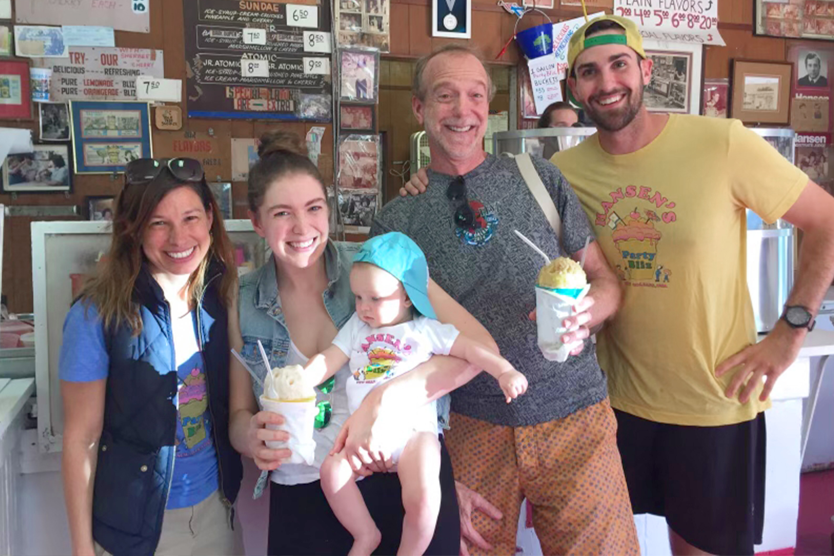 A family enjoys some Sno-balls indoors at Hansen's Sno-Bliz.