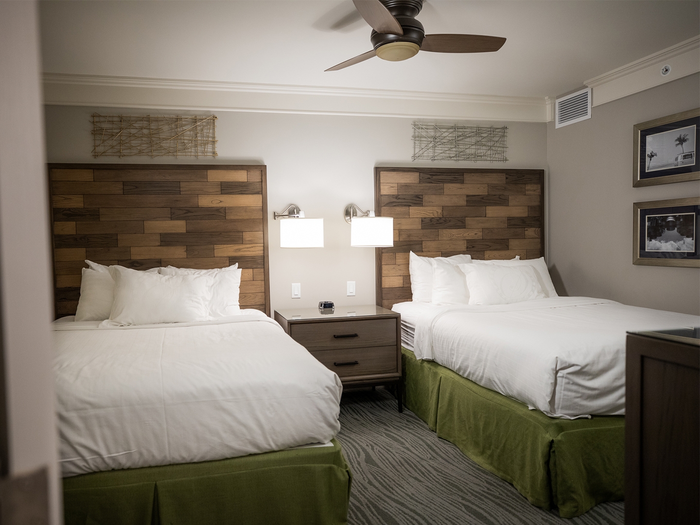 Bedroom with two beds in a two-bedroom Signature Collection villa at Cape Canaveral Beach Resort.