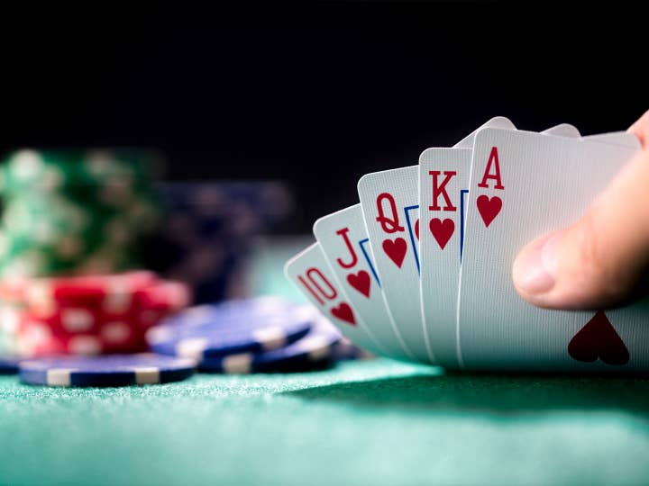 Person playing poker.