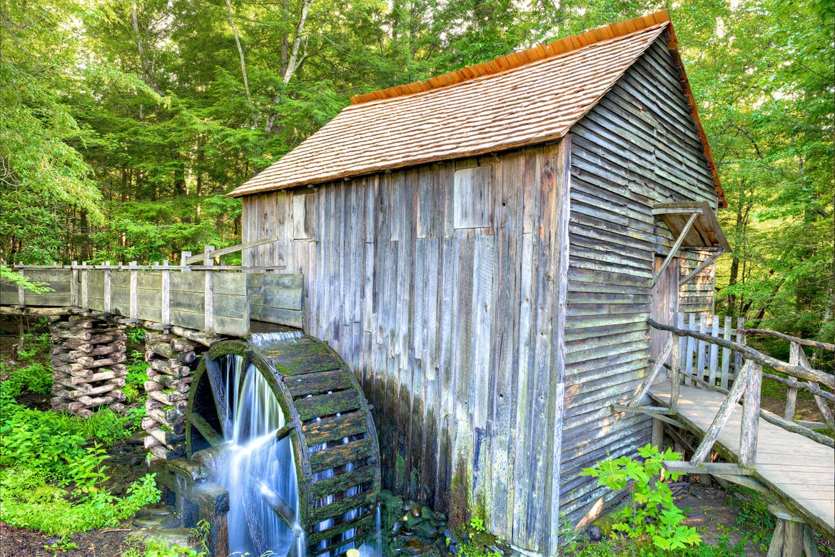 An old grist Mill can be found amongst the lush scenery of Cades Cove