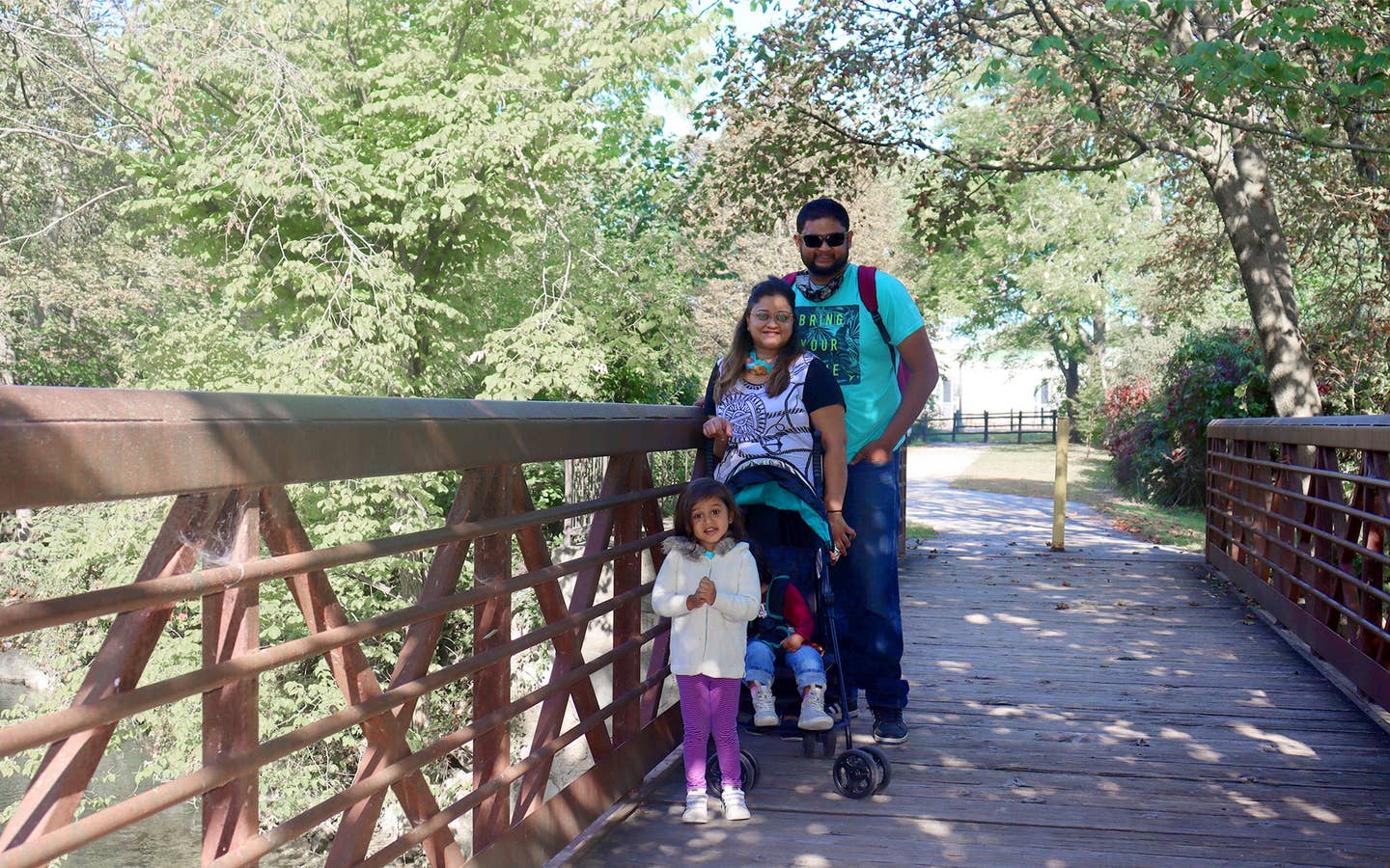 Featured Contributor, Karishma Kittur (top-left), her husband, Rohan (top-right) and two daughters, Myrra (front-left) and Amarra (front-right).