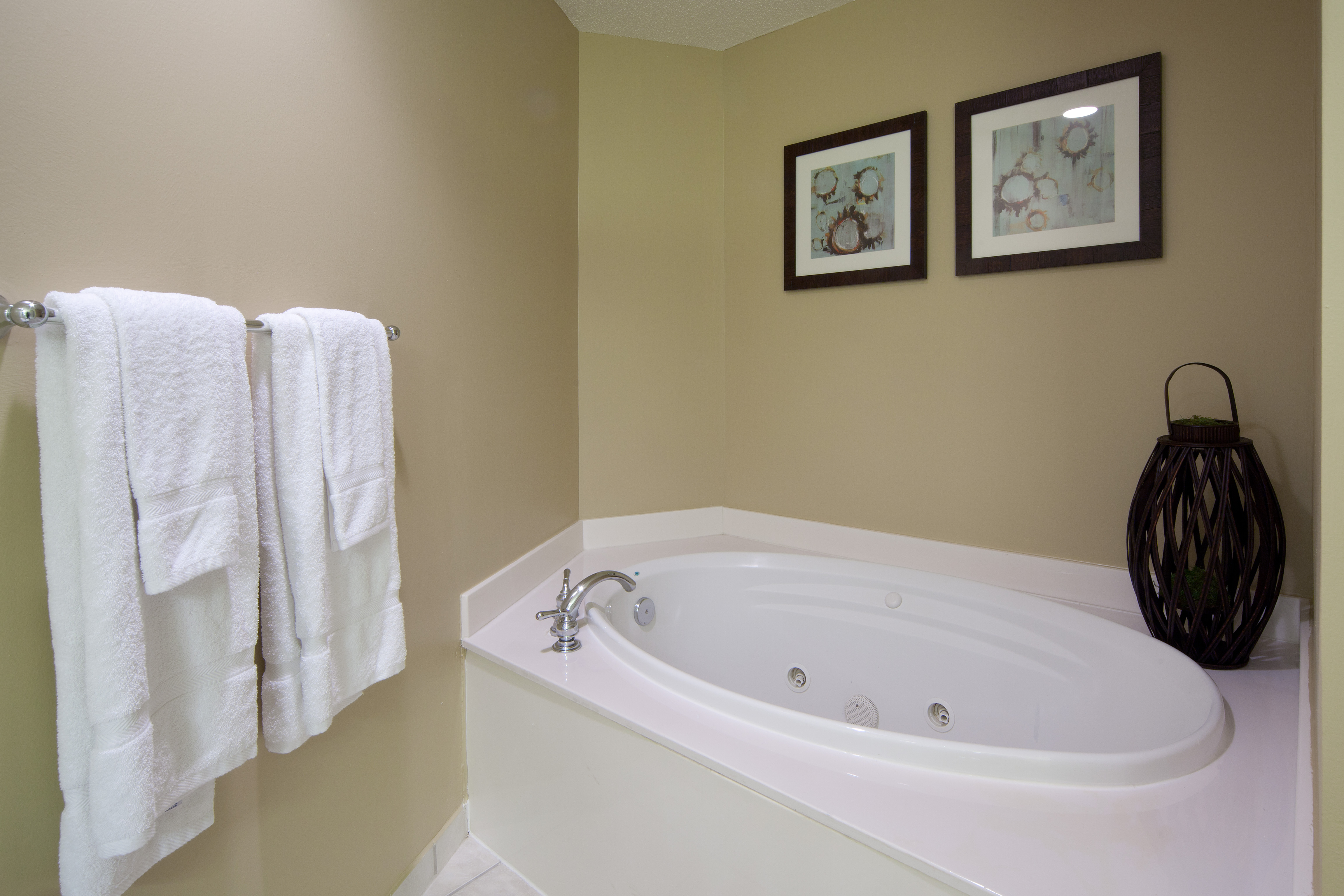Bathroom with spa tub in a two-bedroom villa at Galveston Beach Resort