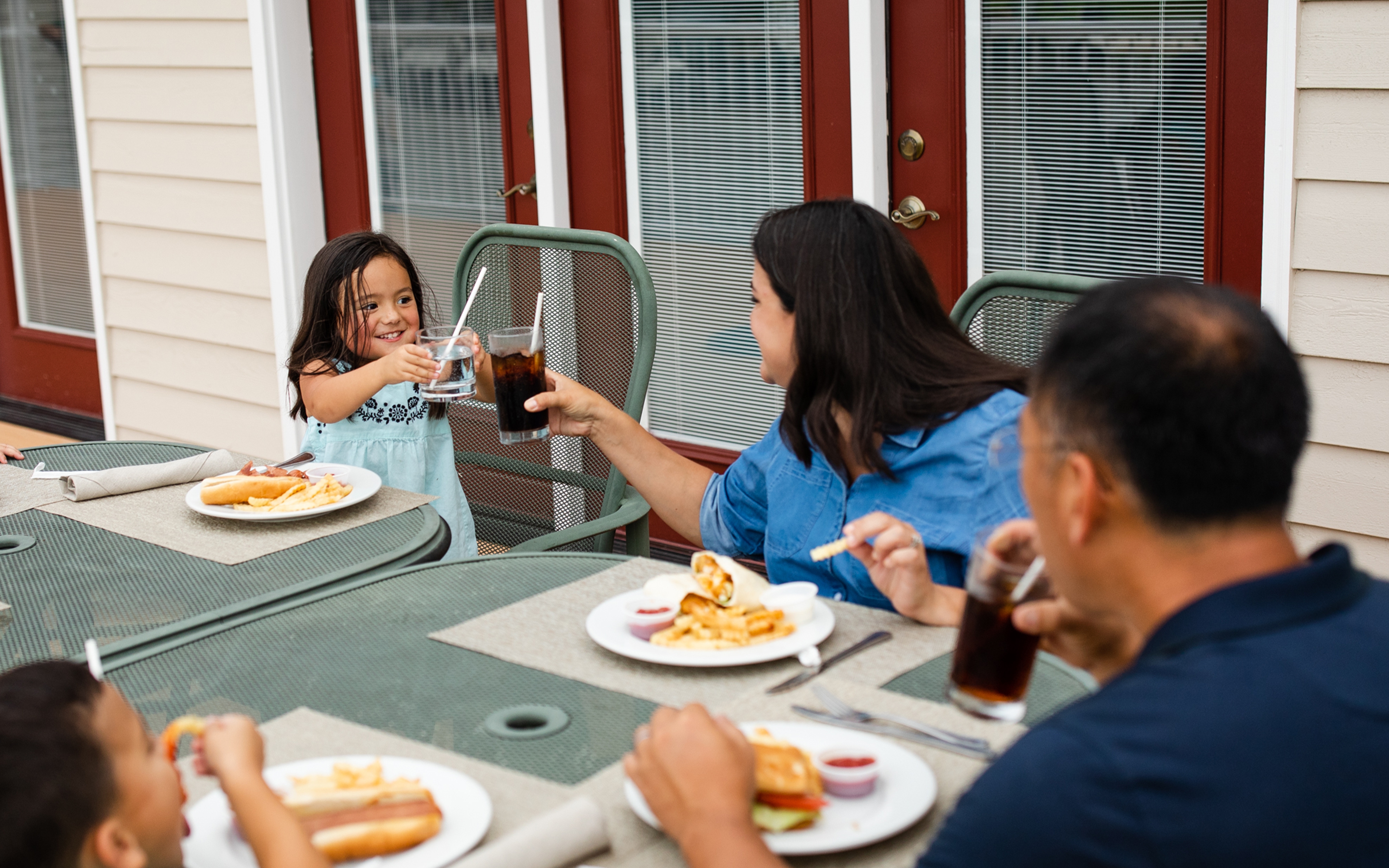 Family eating at Holiday Hills Resort in Branson, Missouri.