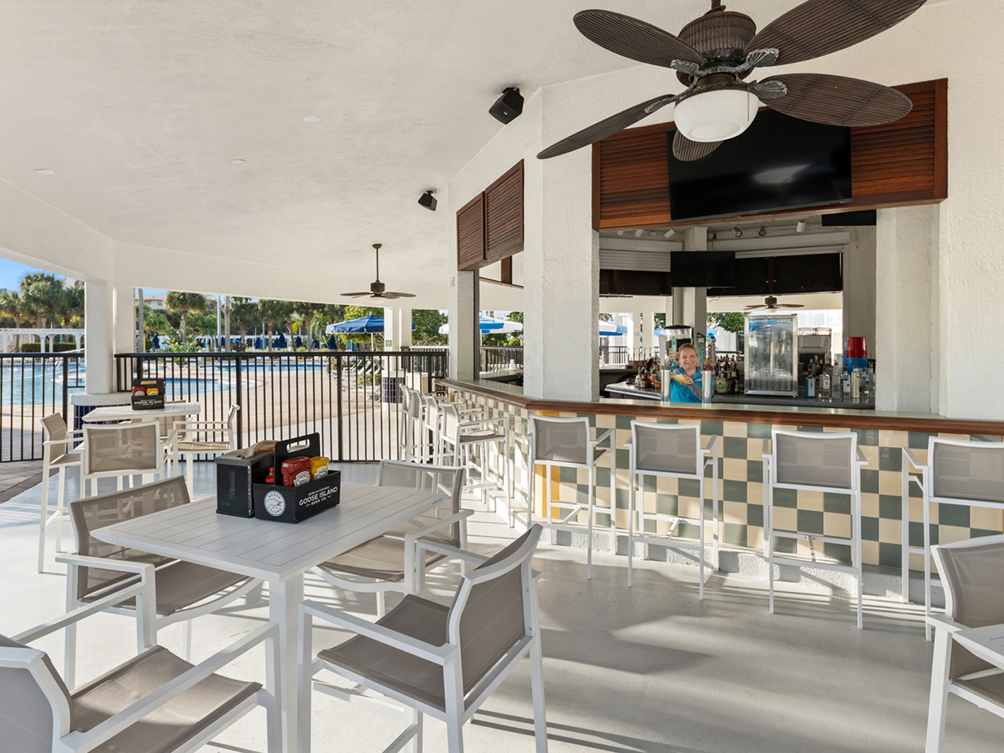 Outdoor seating at Cape Grill & Bar at Cape Canaveral Beach Resort.