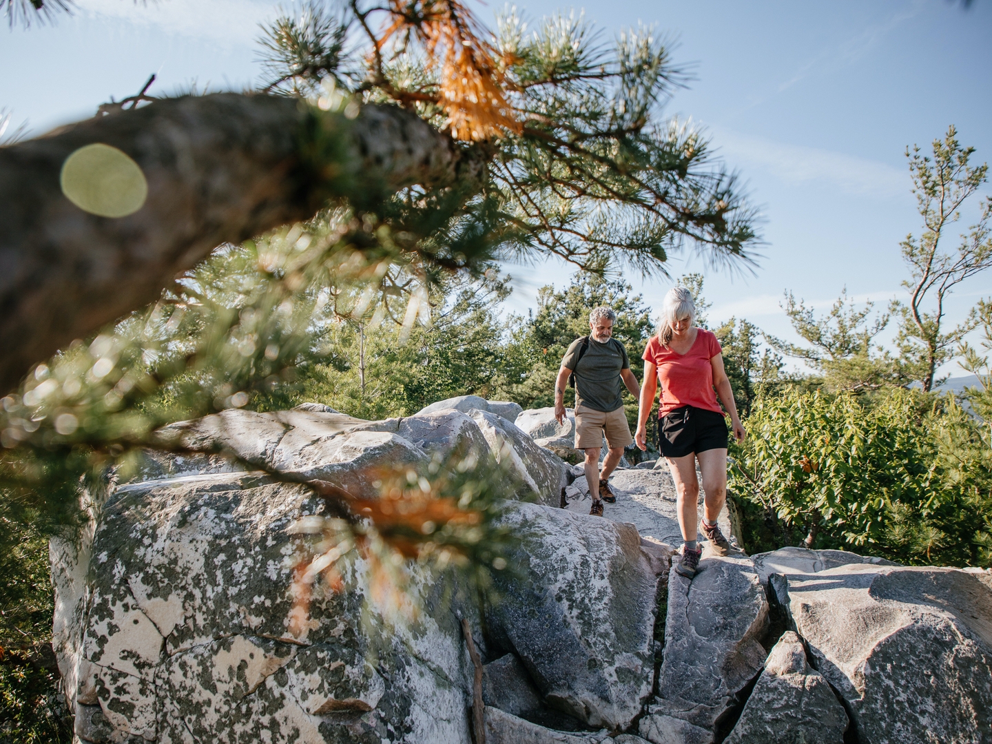 Couple hiking at Monument Mountain near Oak n' Spruce Resort in South Lee, Massachusetts.