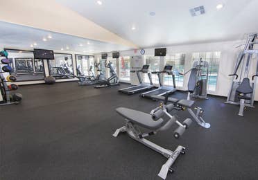 Fitness center with treadmills at Desert Club Resort