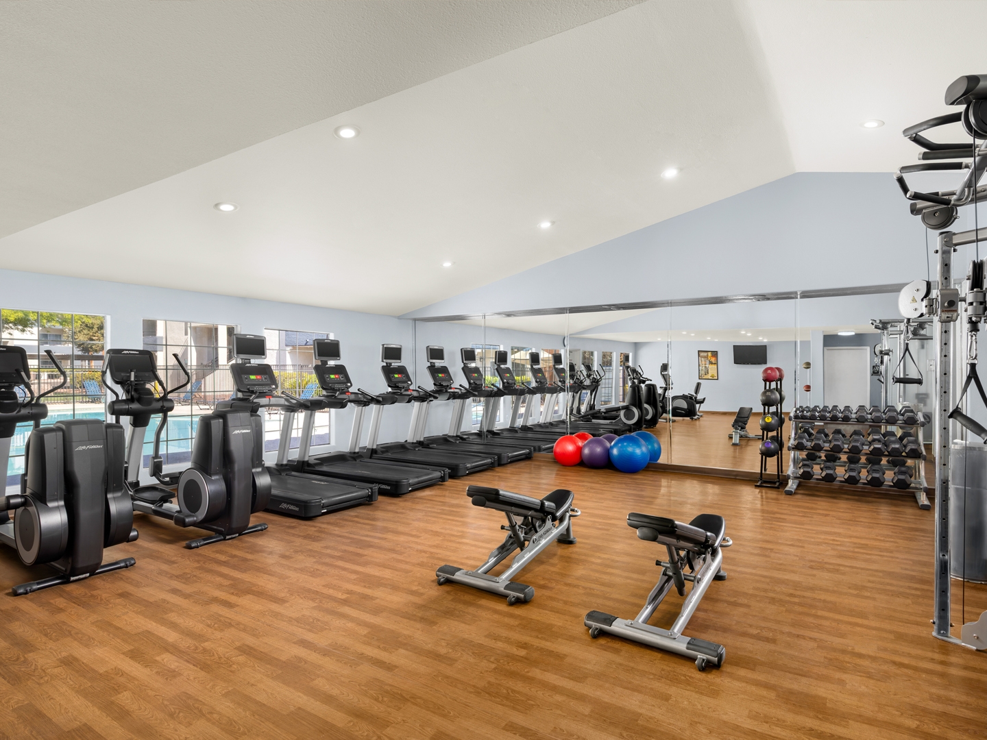 Fitness center with treadmills at Desert Club Resort