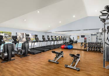 Fitness center with treadmills at Desert Club Resort