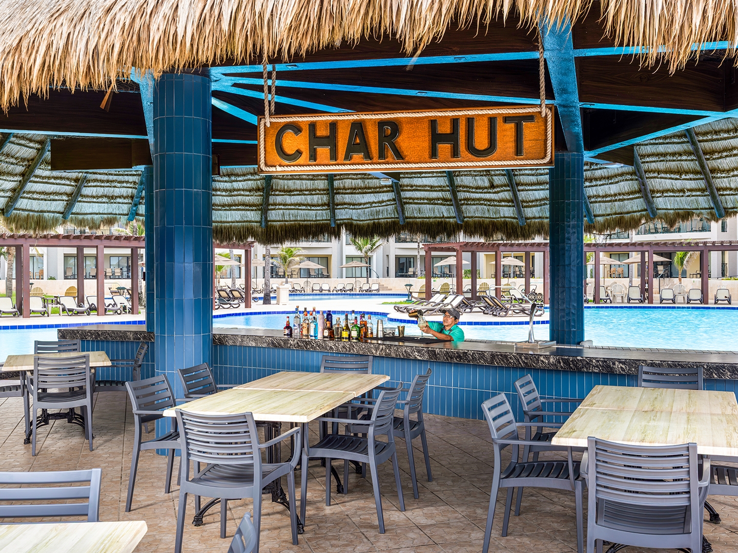 Relaxed poolside dining and drinks at Char Hut.