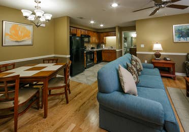 Living room and kitchen in a villa at Orlando Breeze Resort.