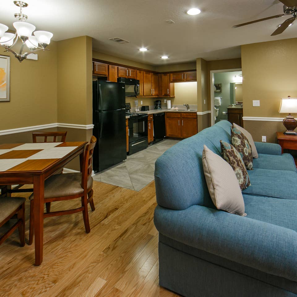 Living room and kitchen in a villa at Orlando Breeze Resort.