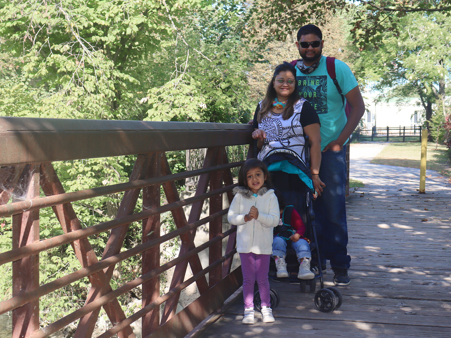 Featured Contributor, Karishma Kittur (top-left), her husband, Rohan (top-right) and two daughters, Myrra (front-left) and Amarra (front-right).