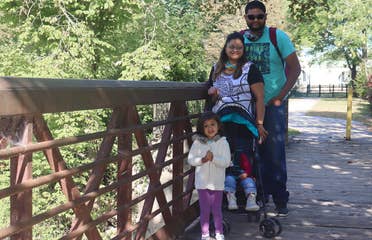 Featured Contributor, Karishma Kittur (top-left), her husband, Rohan (top-right) and two daughters, Myrra (front-left) and Amarra (front-right).