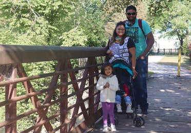 Featured Contributor, Karishma Kittur (top-left), her husband, Rohan (top-right) and two daughters, Myrra (front-left) and Amarra (front-right).