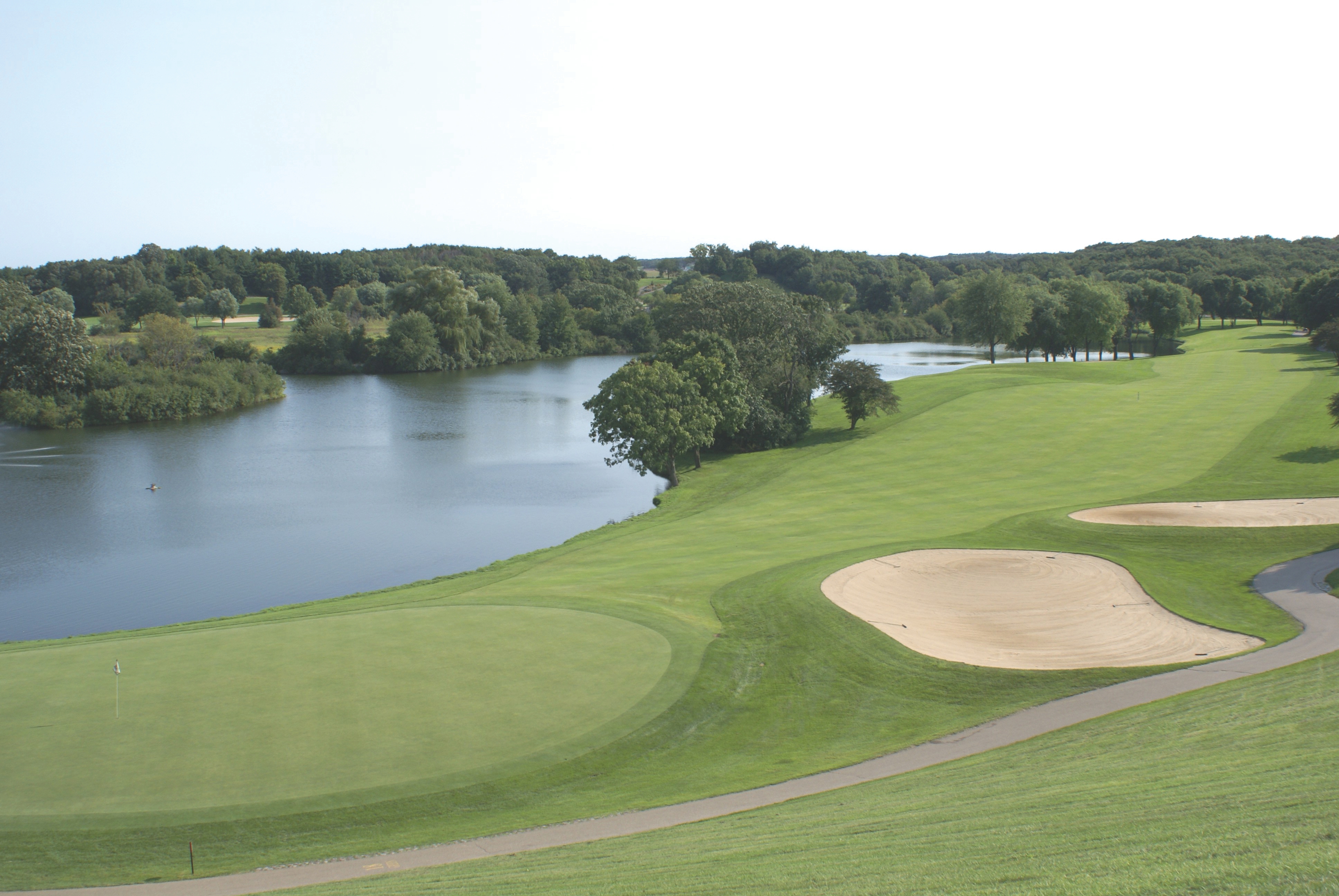 Outdoor golf course by lake at Lake Geneva Resort in Wisconsin.