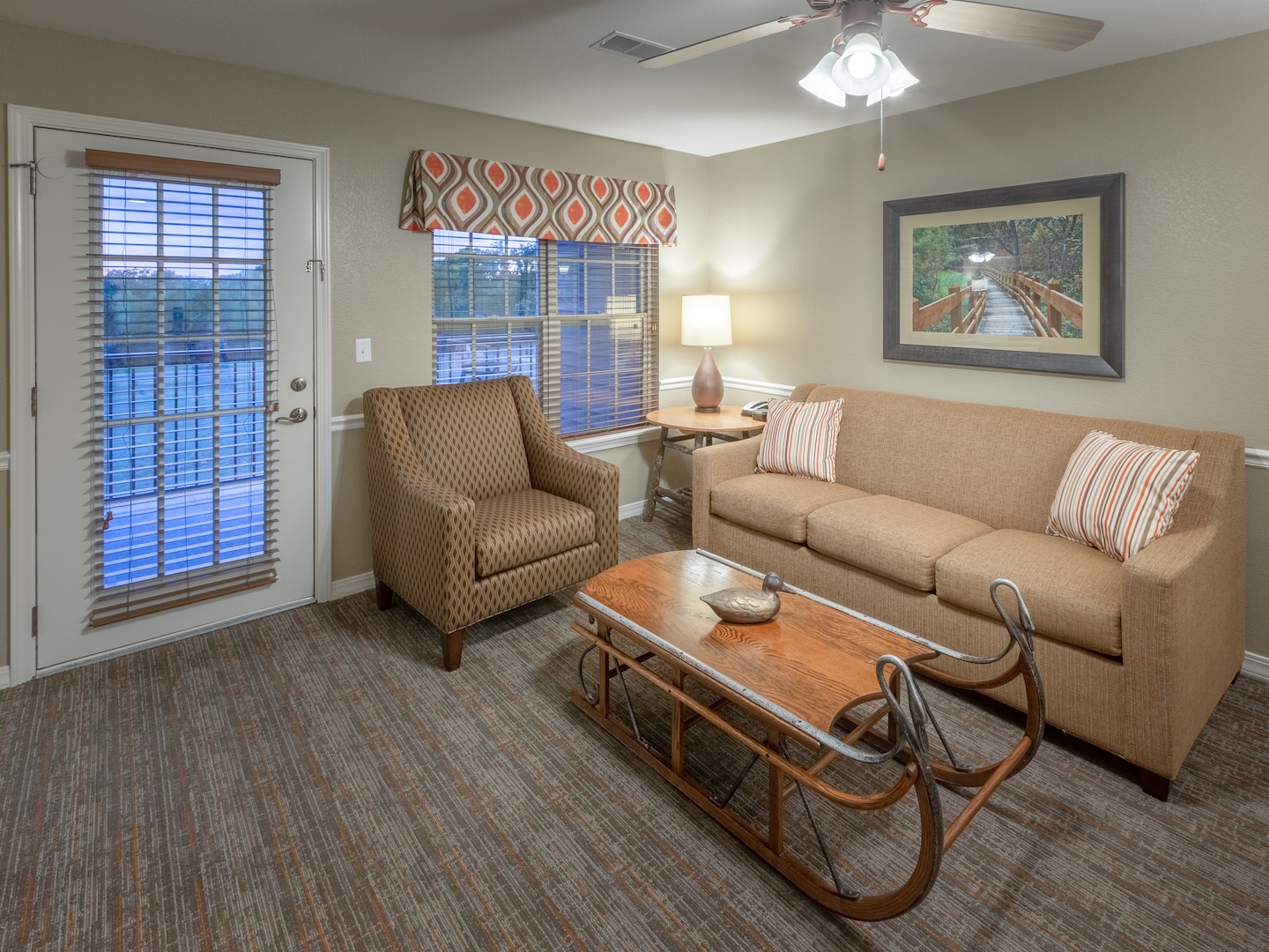 Living room in a two-bedroom villa at Holiday Hills Resort in Branson, MO.