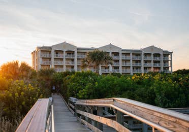 Property building at sunset at Cape Canaveral Beach Resort in Florida