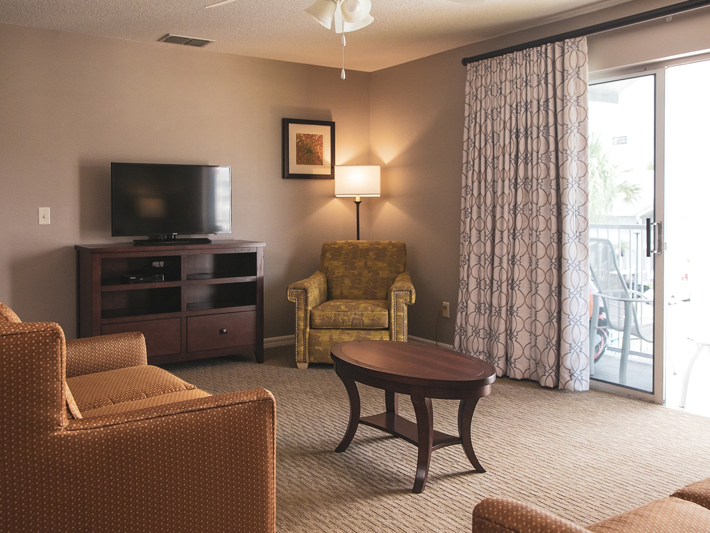 Living room in a three-bedroom villa at Orlando Breeze Resort.