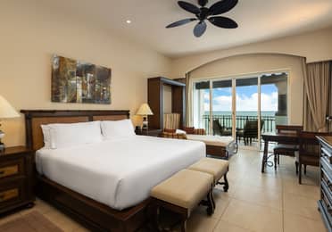 Beachfront bedroom with king bed and spacious access.