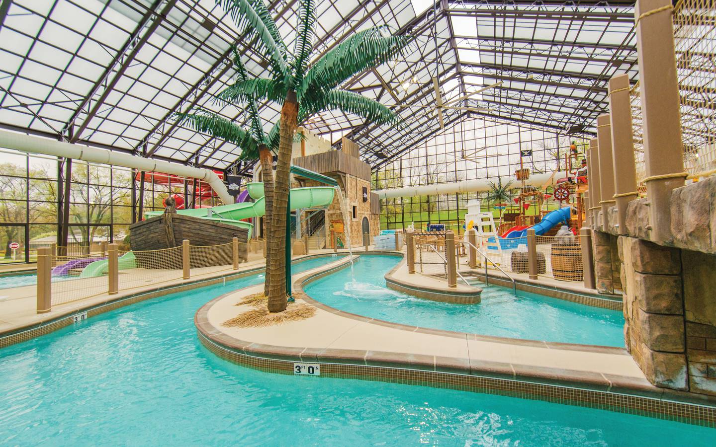 Indoor lazy river and water feature at Pirate's Cay Water Park at Fox River Resort in Sheridan, Illinois