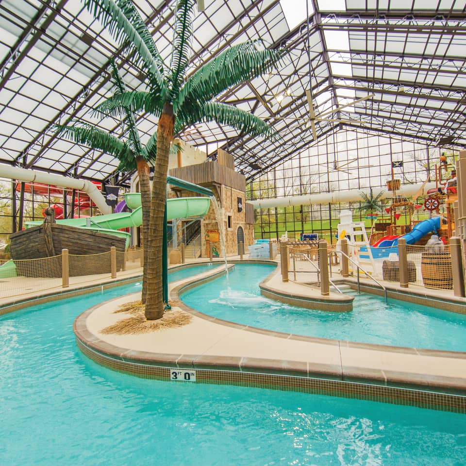 Indoor lazy river and water feature at Pirate's Cay Water Park at Fox River Resort in Sheridan, Illinois