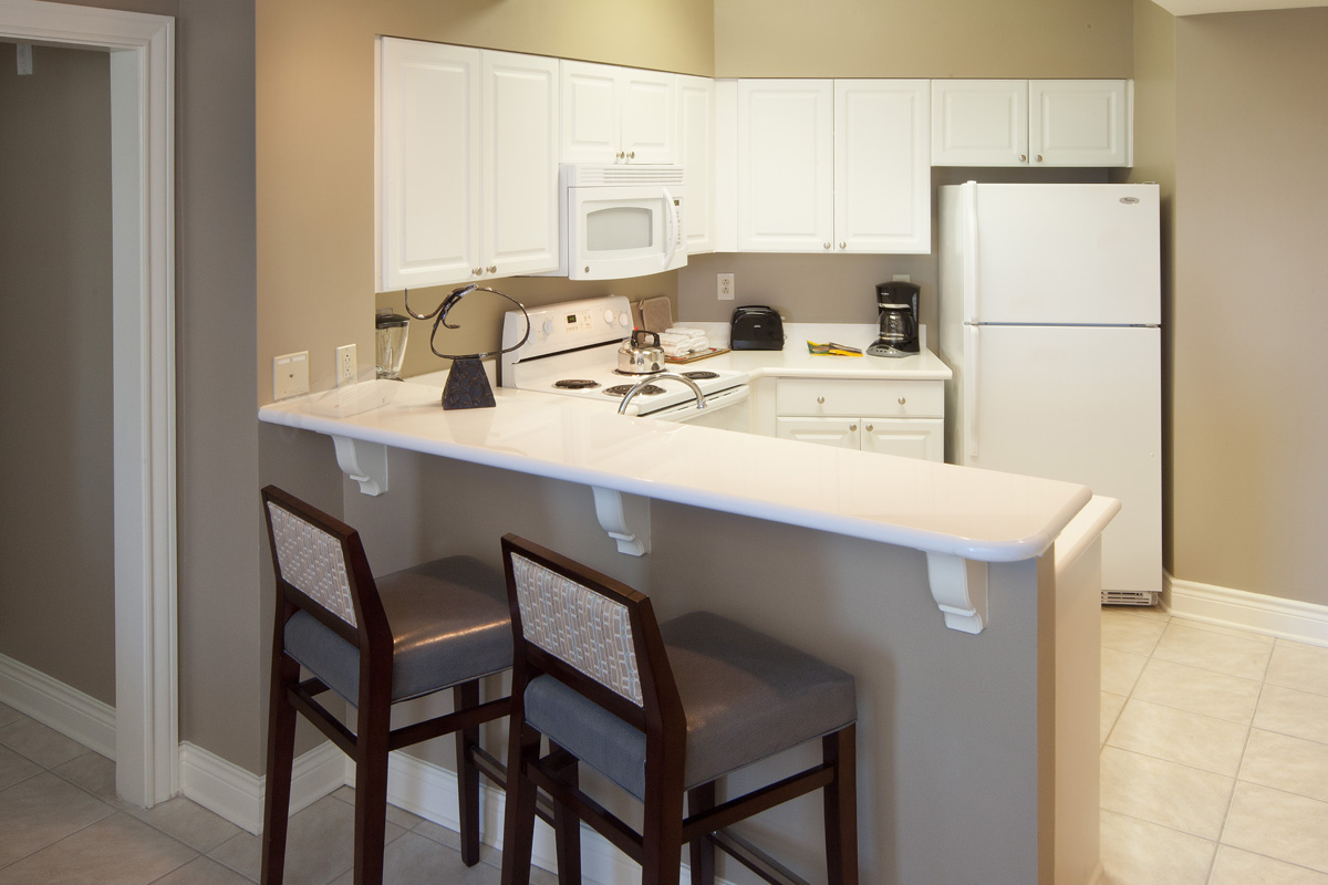 Kitchen with fridge, oven and microwave in a villa at Galveston Beach Resort
