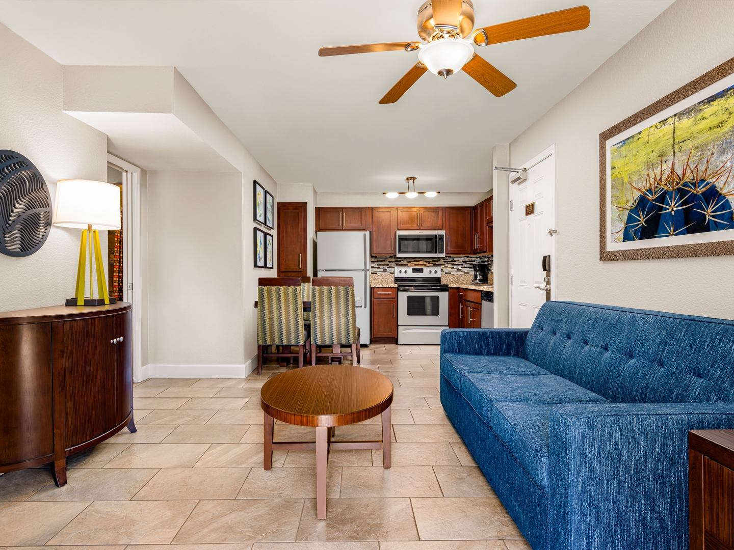 Inviting suite with full kitchen, dining area, and cozy living space.
