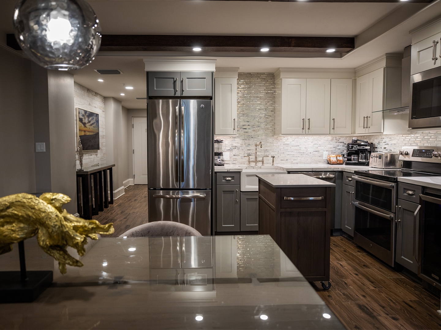 Full kitchen with stainless steel appliances in a two-bedroom Signature Collection villa at Cape Canaveral Beach Resort.