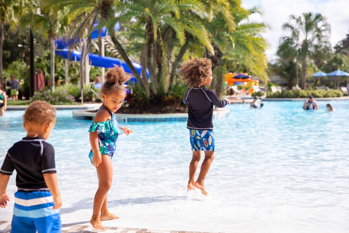 Featured Contributor, Sally Butan's children enter the pool at our Orange Lake resort located near Orlando, FL.
