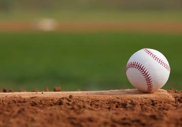 baseball on the field at Minute Maid Park near Piney Shores Resort in Conroe, TX.