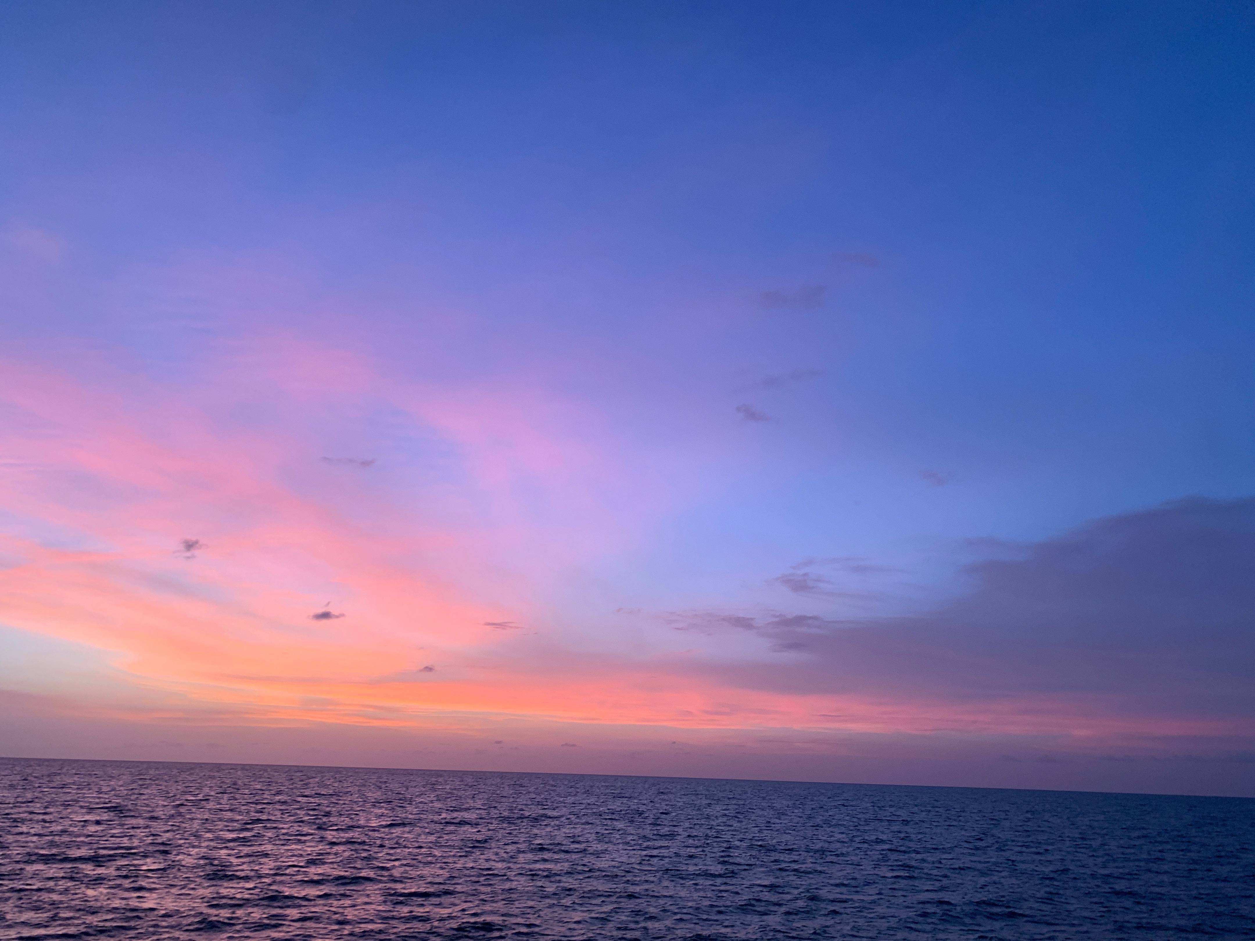 Beautiful, colorful view of the sunset from the beach in Marco Island, Florida.