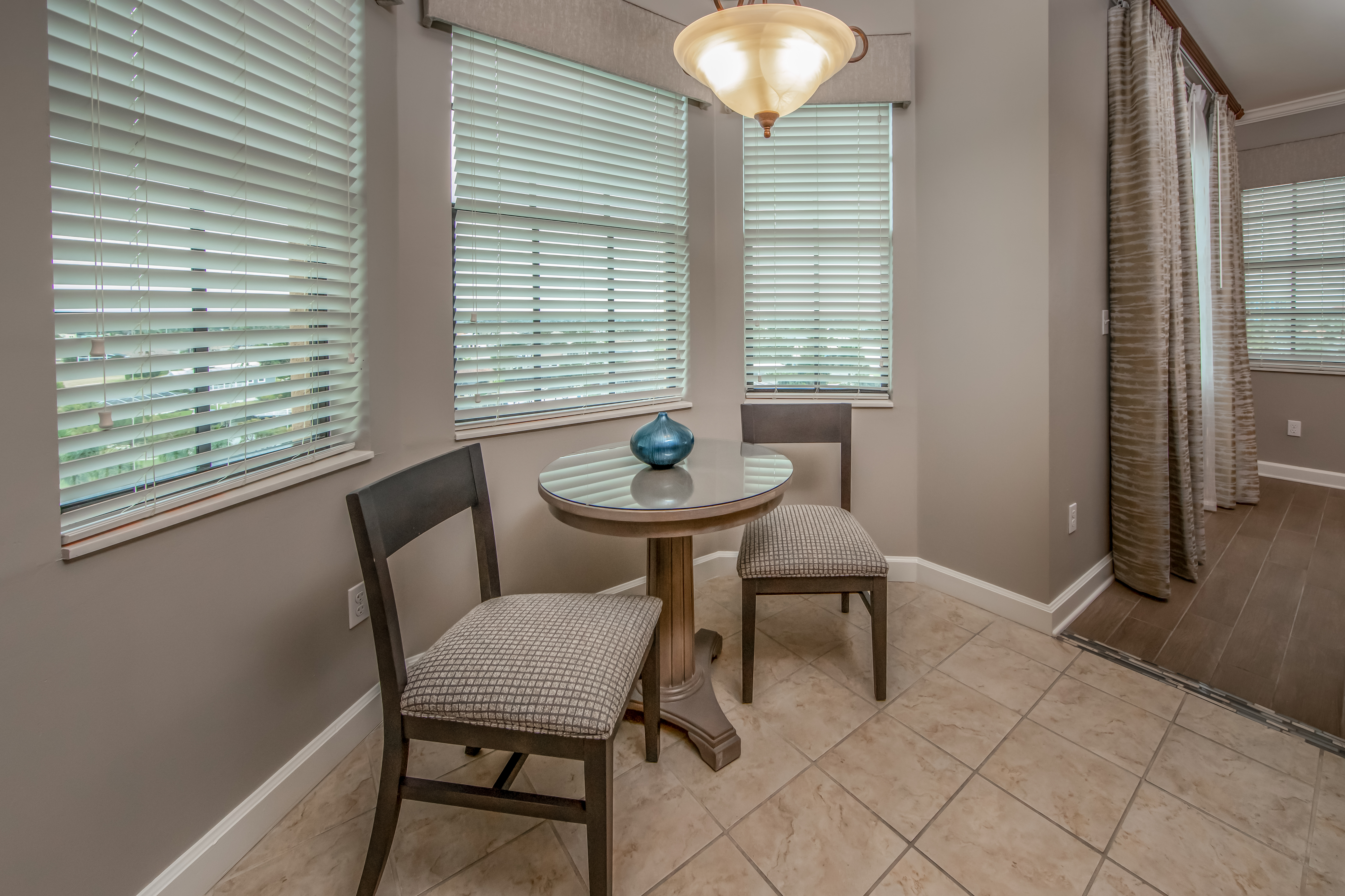 Small seating area in a three-bedroom villa at Sunset Cove Resort in Marco Island, Florida