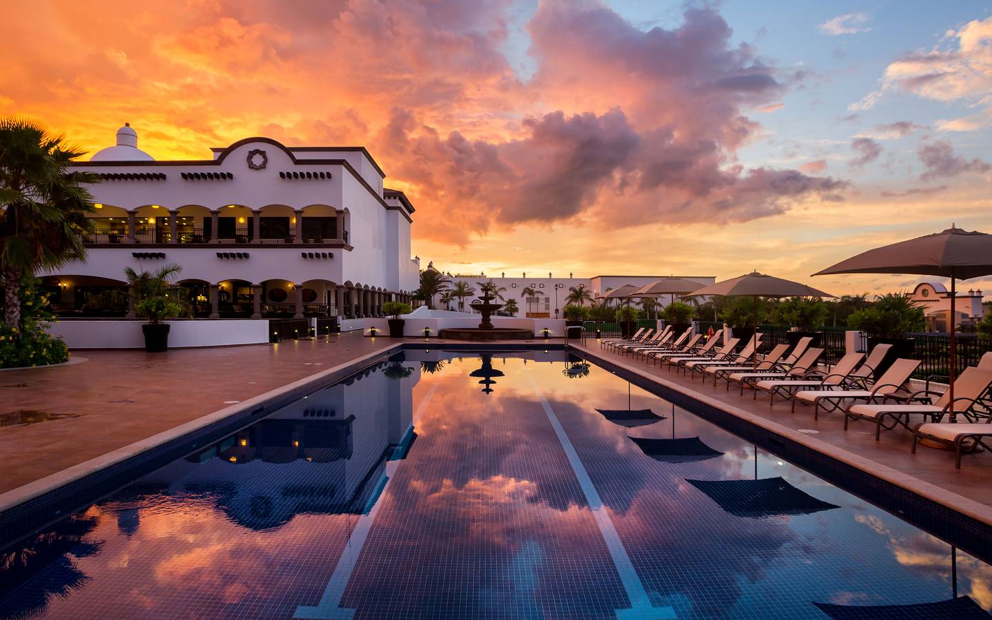 Sunset in the pool at the Grand Residences Resort in Puerto Morelos, Mexico