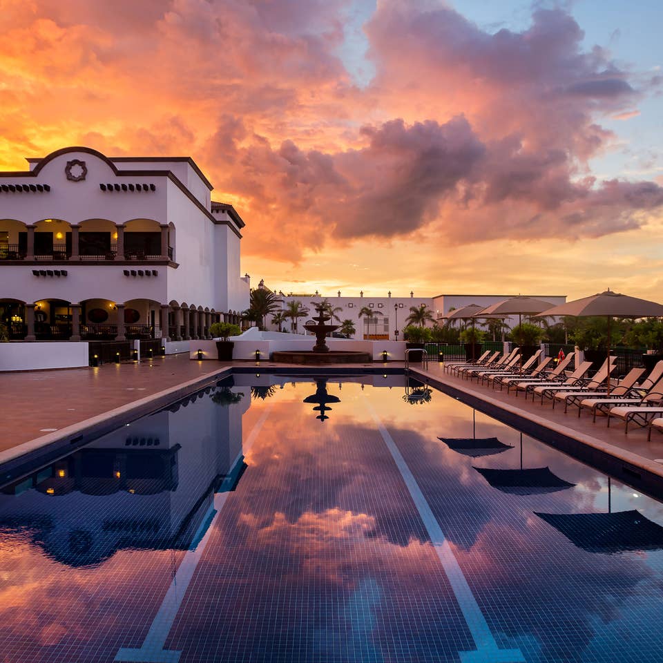 Sunset in the pool at the Grand Residences Resort in Puerto Morelos, Mexico