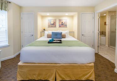 Master bedroom in a three-bedroom villa at Villages Resort