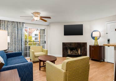 Elegant living area with modern furnishings and a cozy fireplace.