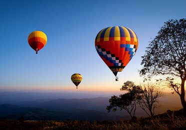 Three hot air balloons in the sky