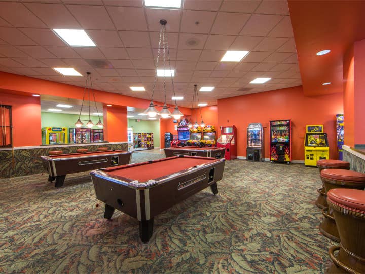 Game room with pool table at Cape Canaveral Beach Resort.