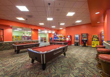 Game room with pool table at Cape Canaveral Beach Resort.