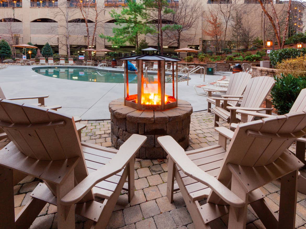 The outdoor firepit near the pool at our Smoky Mountain Resort in Gatlinburg, TN.