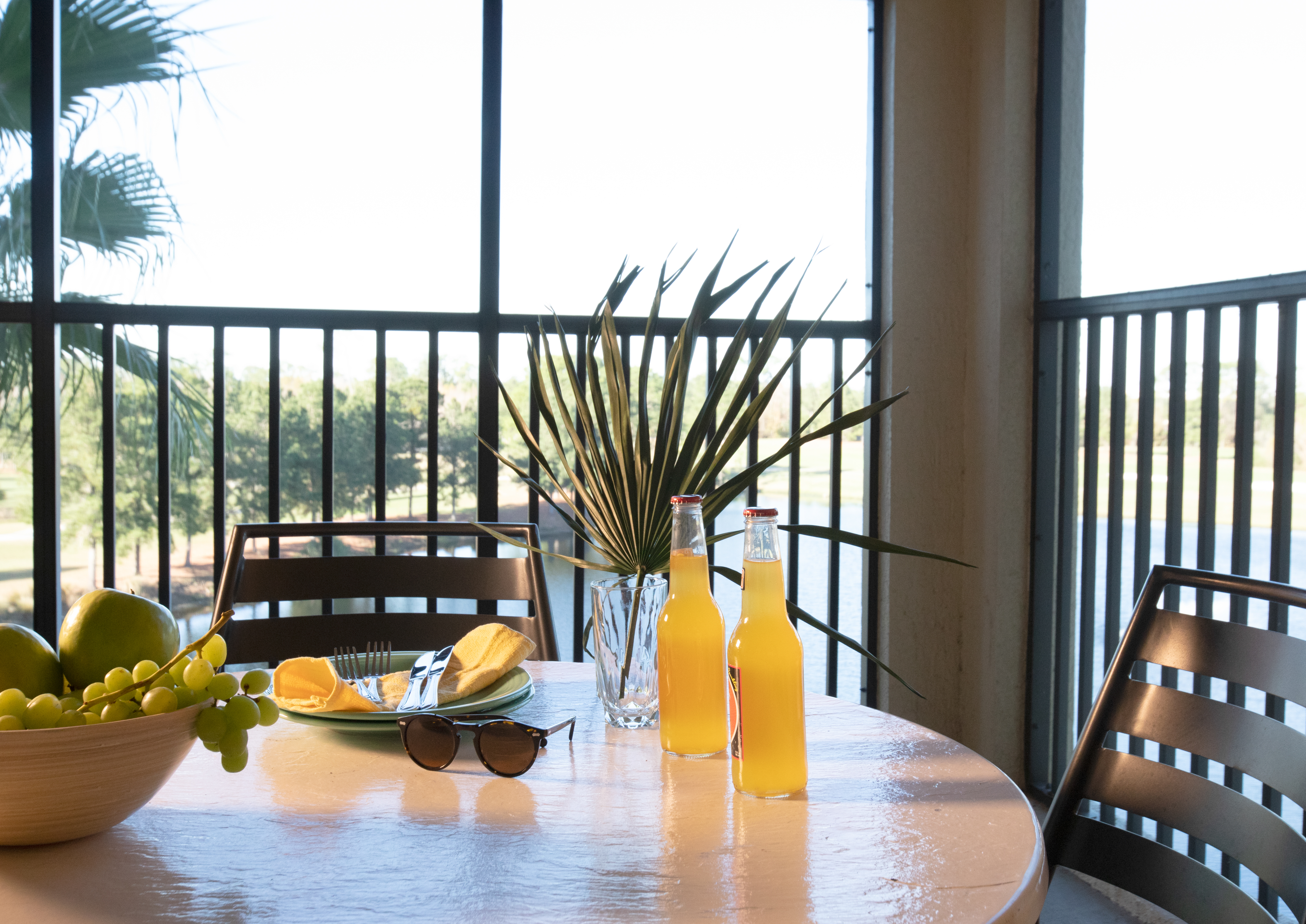 Furnished balcony with table and two chairs in a villa in East Village at Orange Lake Resort near Orlando, Florida