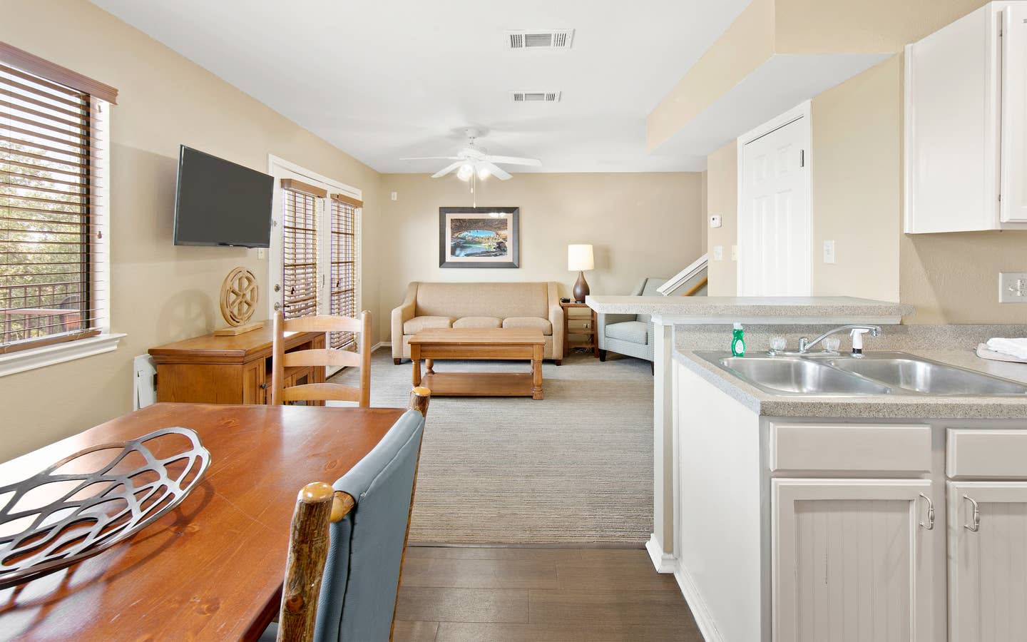 Dining room and living area in two-bedroom townhome at the Hill Country Resort in Canyon Lake, Texas.