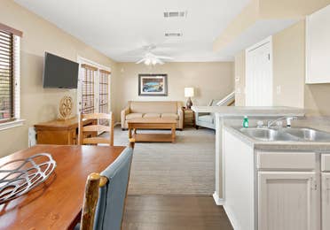 Dining room and living area in two-bedroom townhome at the Hill Country Resort in Canyon Lake, Texas.