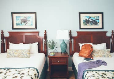 Two beds in a three bedroom villa in West Village at Orange Lake Resort near Orlando, FL
