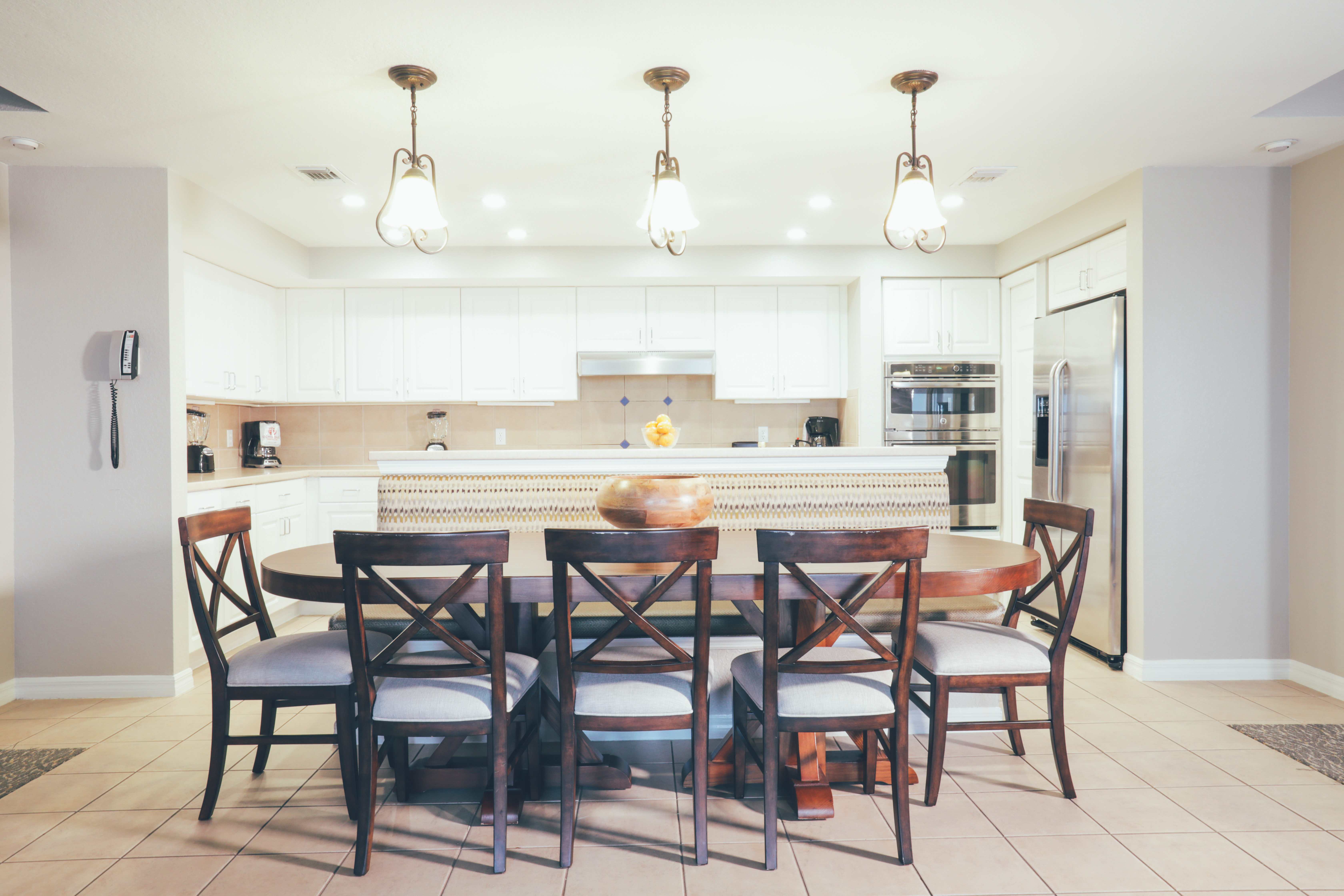 Large dining room table with eight chairs in a villa in River Island at Orange Lake Resort near Orlando, Florida