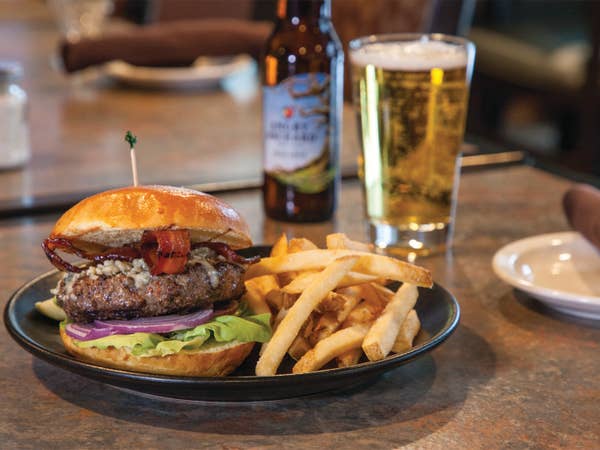 Burger and fries paired with a beer.