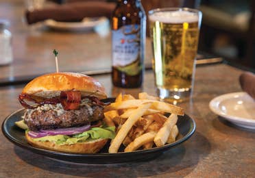 Burger and fries paired with a beer.